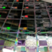 Semiconductor wafer in microelectronics manufacturing light, suggesting chip M&A and edge-AI silicon.
